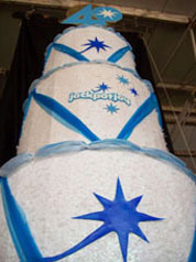 jump out of birthday cake giant prop makers Tentacle Studio