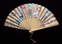 promotional fan with paper stamp decoration
