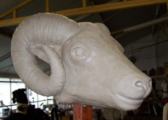 animal ram head sculptue mask in clay